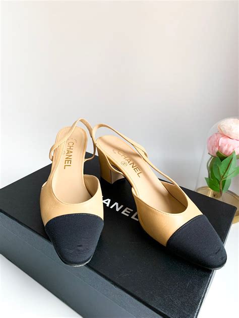 chanel black canvas shoes|Chanel beige and black shoes.